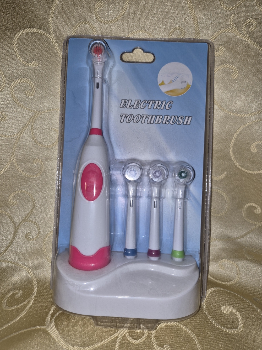 Electric Toothbrush with Pink Accents and 4 Replacement Heads